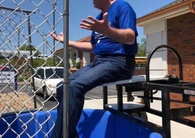 Chad Graham participating in the Dunk Tank at the FCB Rocks the Block presented by First Community Bank on April 28, 2018.